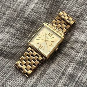 Marc by Marc Jacobs gold tone watch.
